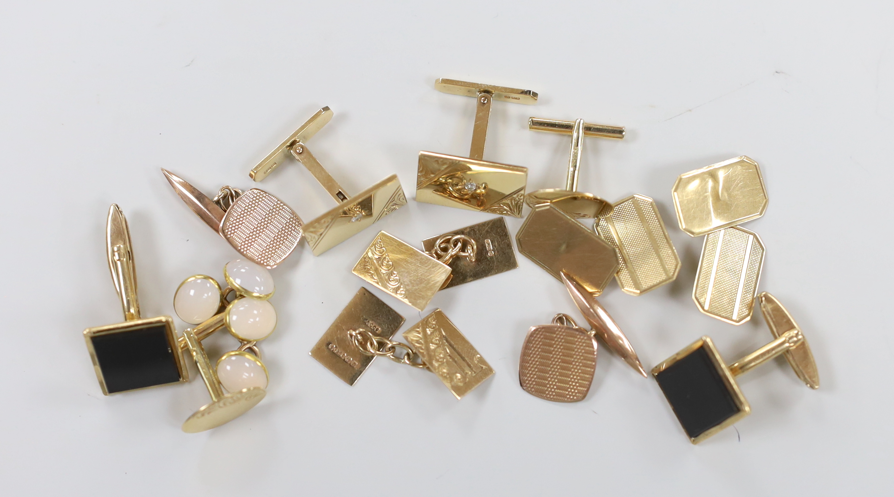 Six assorted modern pairs of 9ct gold cufflinks including diamond chip set and one other yellow metal and cabochon set cufflinks, gross weight 39.2 grams.